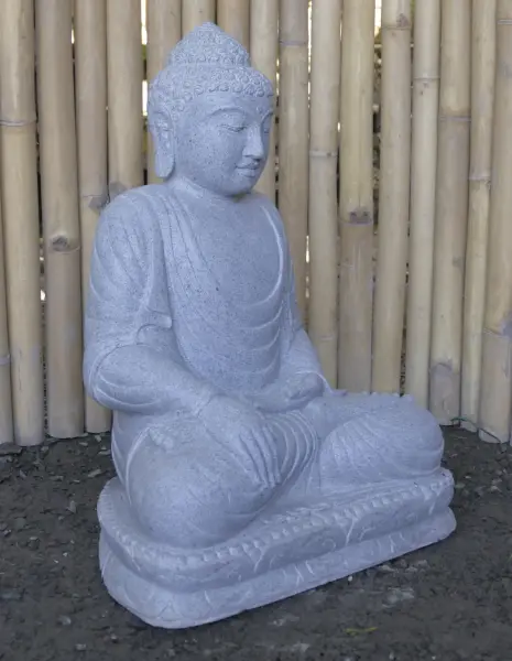 Product image of the product “Seated Buddha made of Riverstone in Bhumisparsha - gesture of touching the earth. 62 cm height. ”